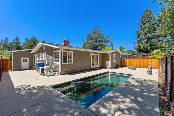 a house view with a backyard space