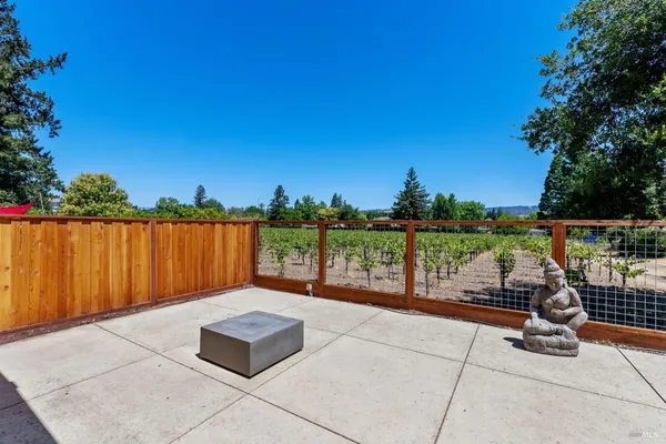 a balcony with furniture and city view
