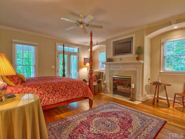 12509 Raven Ridge Road Raleigh, NC 27614 - Photo 12 of 25 Great space that could be guest suite, studio, study or office! Has fireplace, closet, and full bath! Has access to front porch. Studio/Study/Office