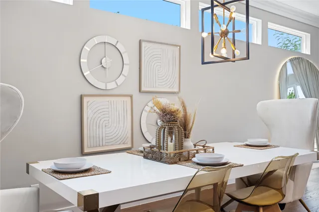 a bedroom with a bed couch and a window