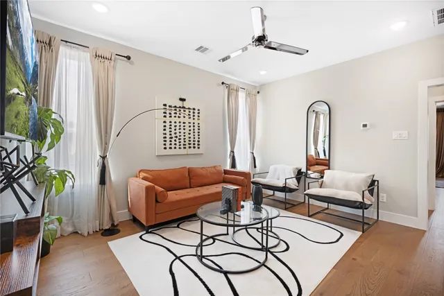 a view of walk in closet with clothes