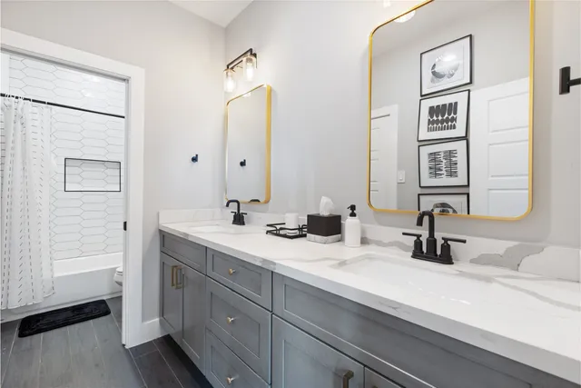 a view of a house with a patio and a yard