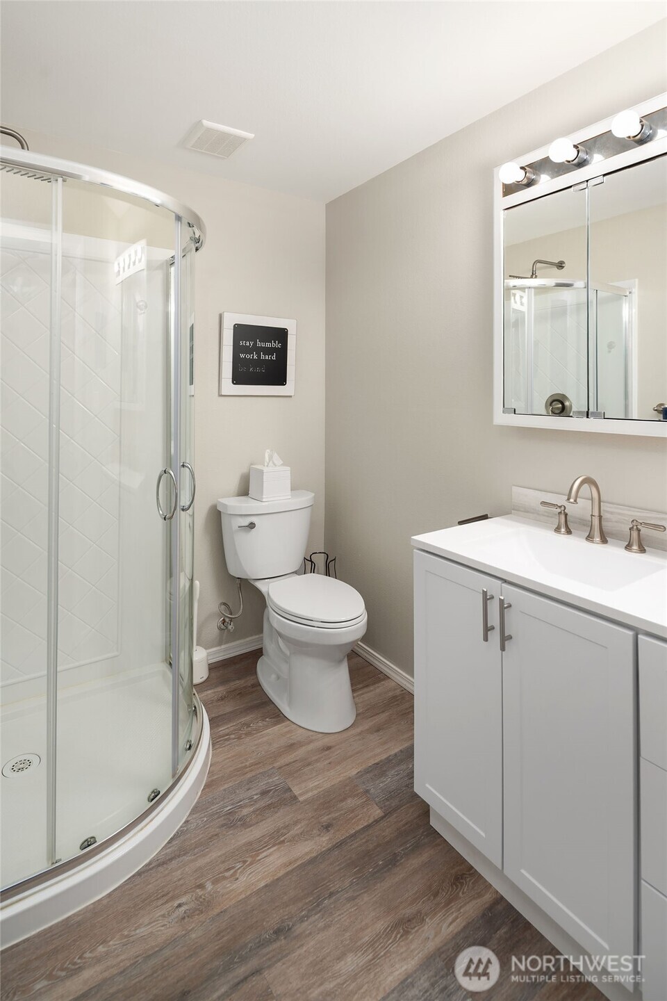 1067 Anacortes Avenue Northeast Renton, WA 98059 - Photo 15 of 34 a bathroom with a granite countertop sink toilet and shower