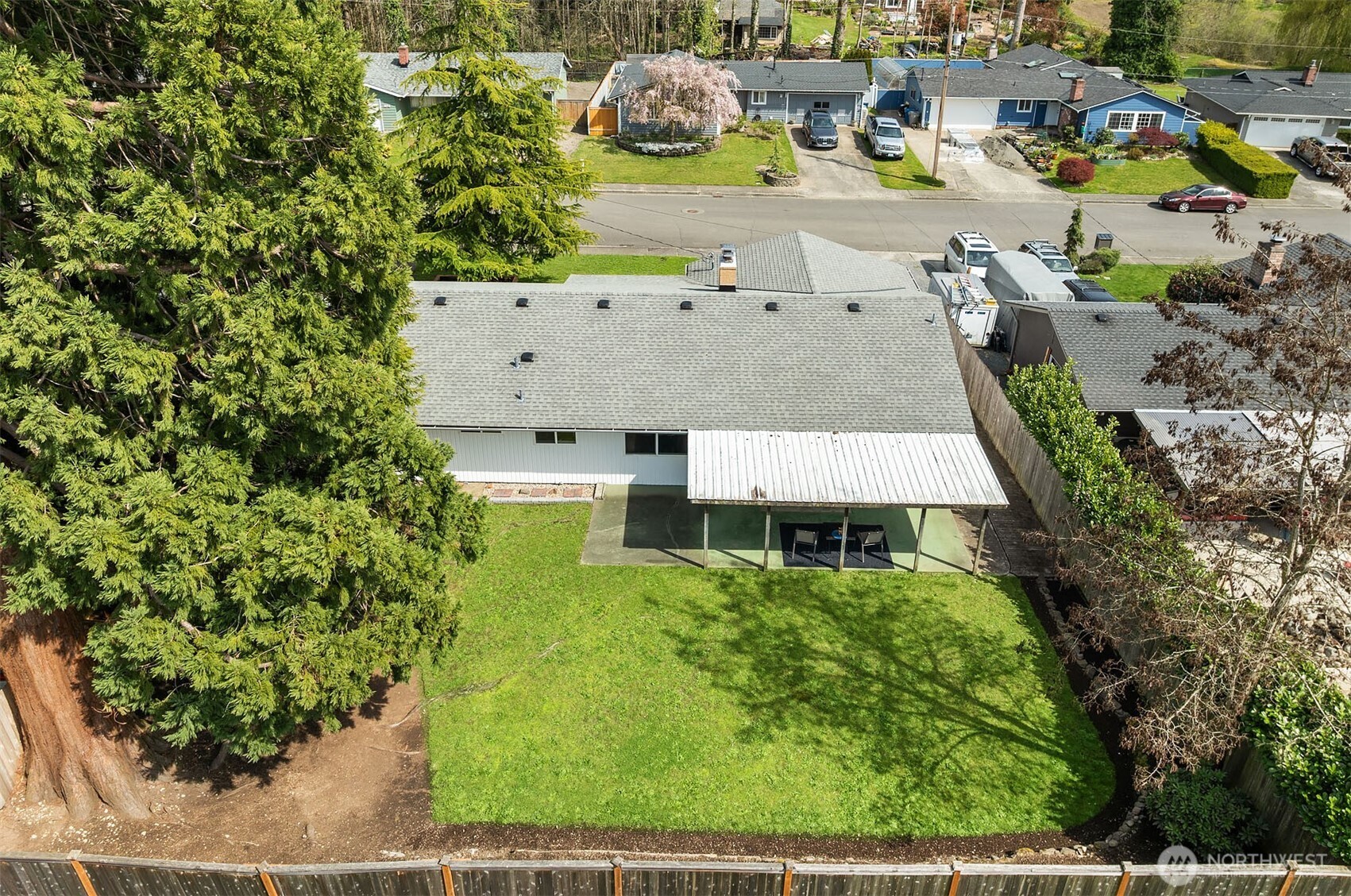 1067 Anacortes Avenue Northeast Renton, WA 98059 - Photo 27 of 34 an aerial view of multiple houses with yard