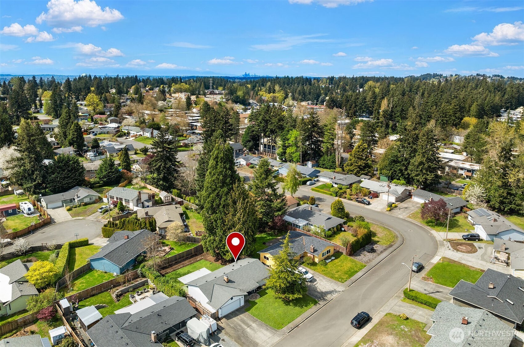 1067 Anacortes Avenue Northeast Renton, WA 98059 - Photo 31 of 34 an aerial view of residential houses with outdoor space