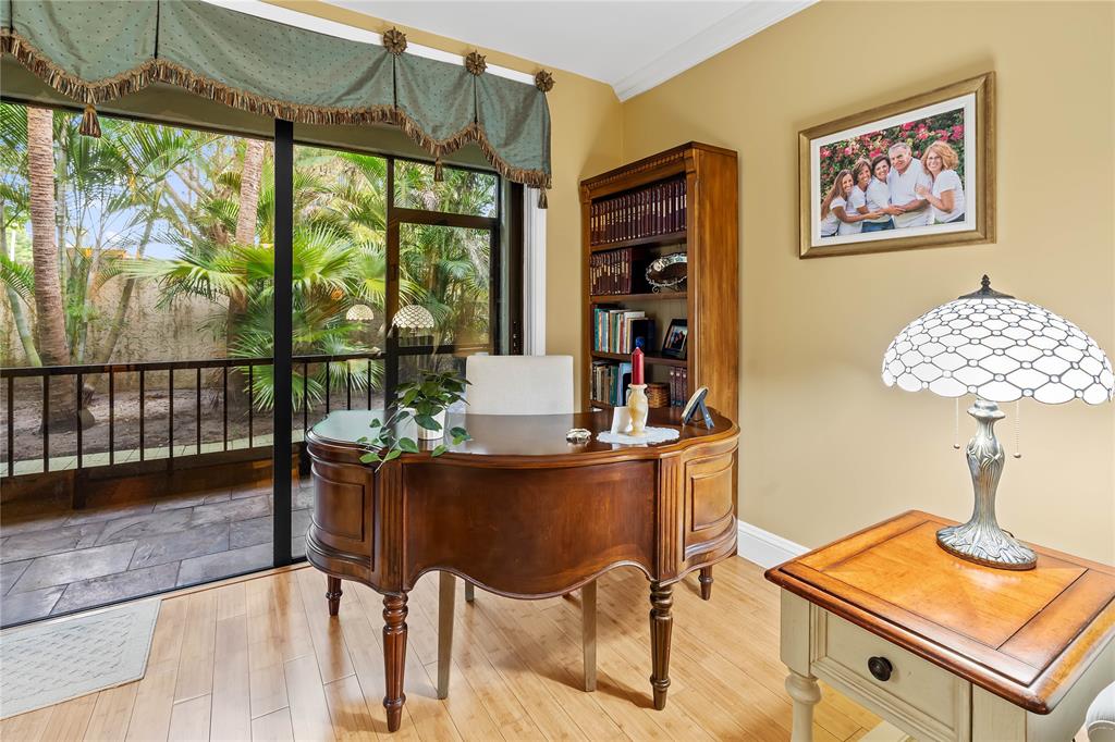 7970 La Mirada Drive, Unit 20 Boca Raton, FL 33433 - Photo 15 of 38 a view of a workspace with furniture and a window