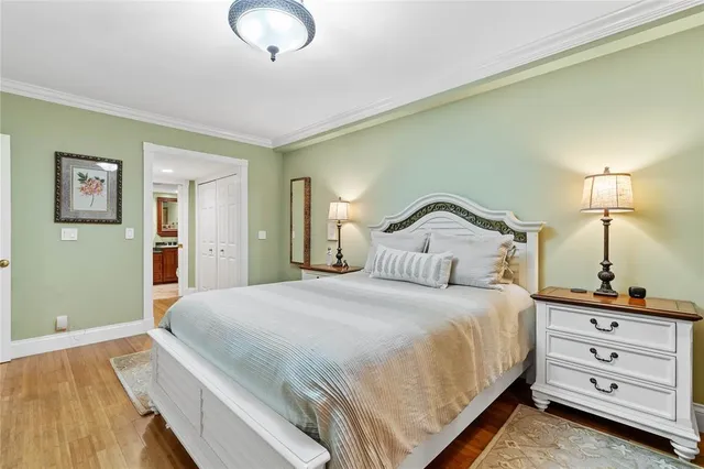 a bedroom with a bed and closet