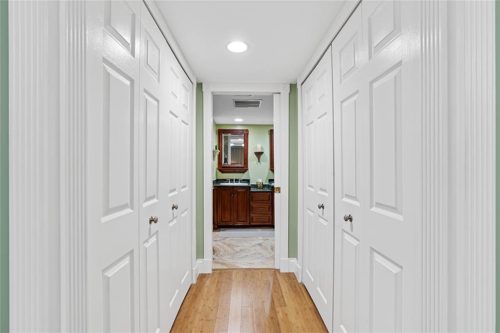 7970 La Mirada Drive, Unit 20 Boca Raton, FL 33433 - Photo 22 of 38 a view of a hallway with a livingroom and a bathroom