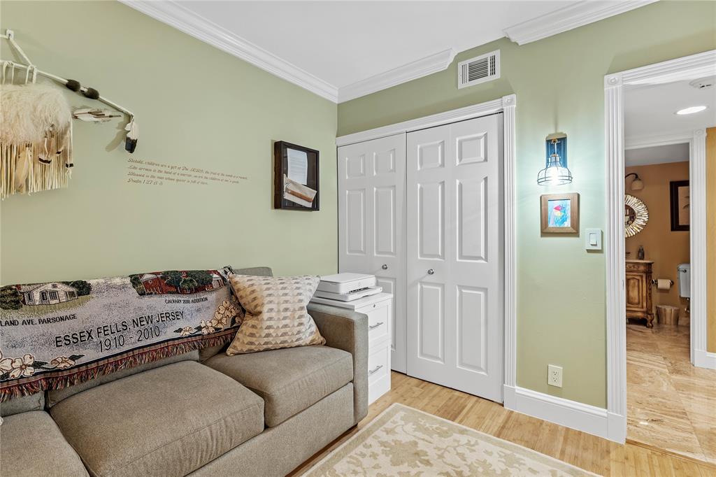 7970 La Mirada Drive, Unit 20 Boca Raton, FL 33433 - Photo 30 of 38 a living room with furniture and a rug