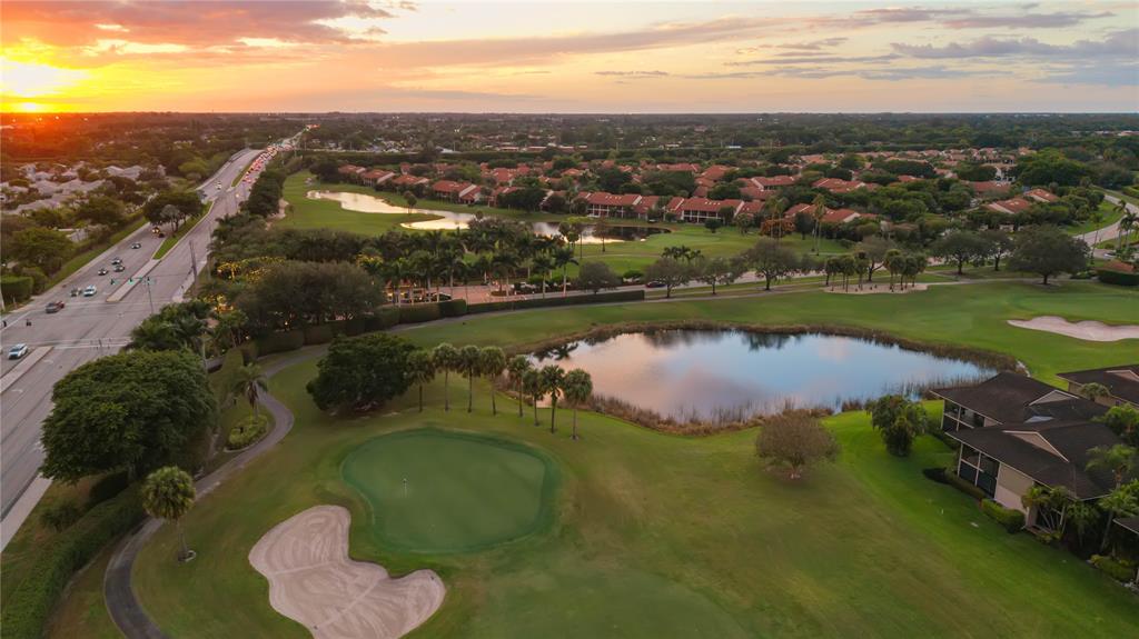 7970 La Mirada Drive, Unit 20 Boca Raton, FL 33433 - Photo 38 of 38 an aerial view of lake residential houses with outdoor space and river