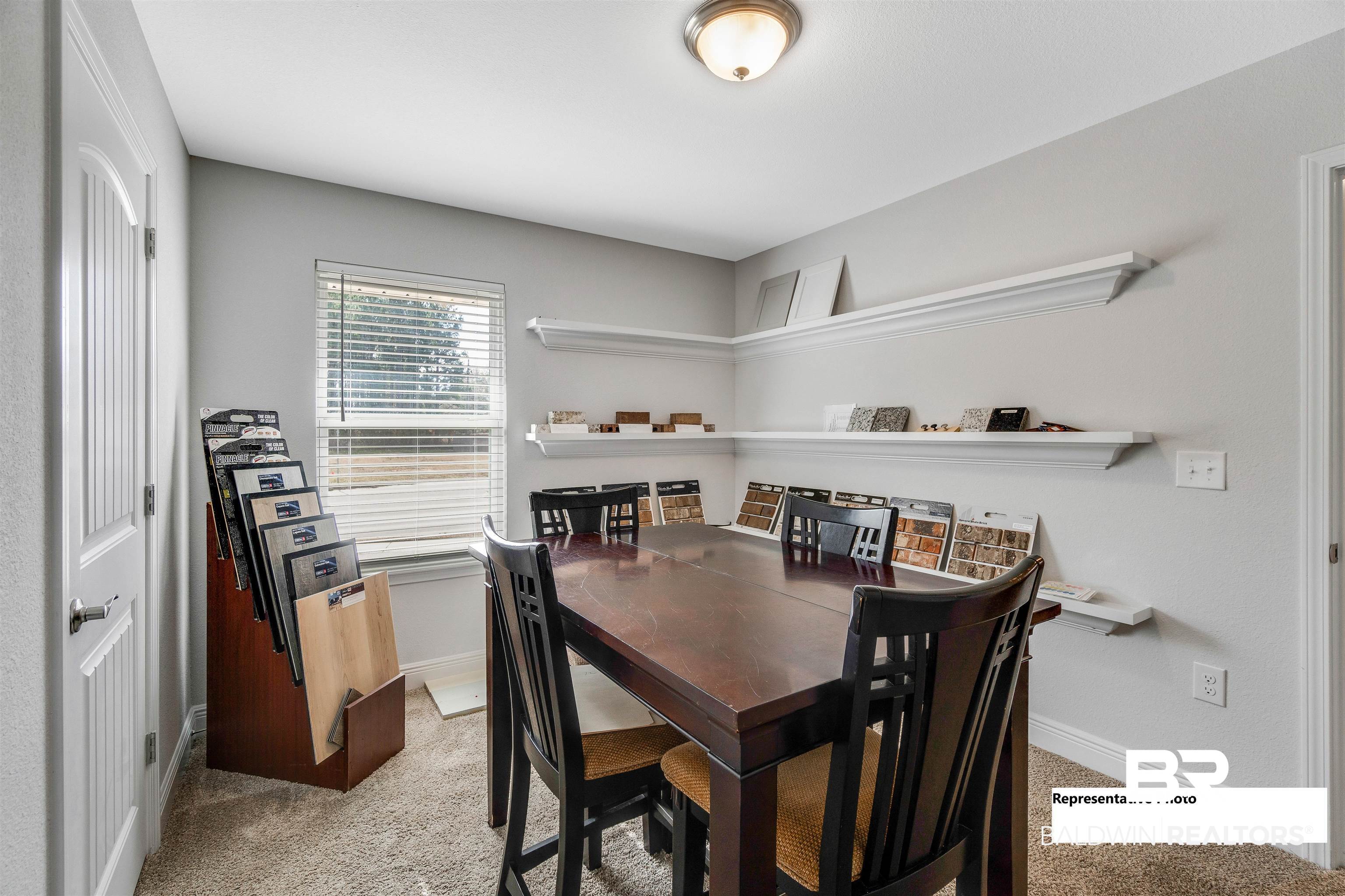 643 Mayflower Drive Foley, AL 36535 - Photo 6 of 34 Dining room with baseboards and light colored carpet