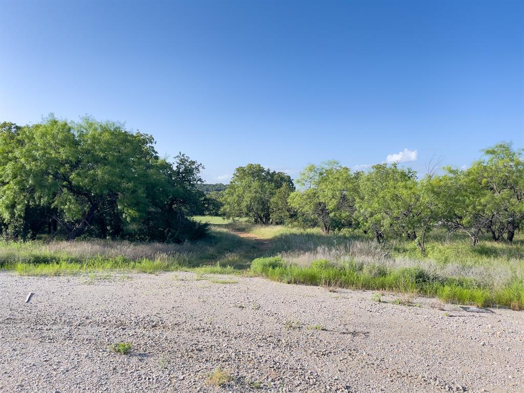 L 1 Rivertrail Circle Mingus, TX 76463 - Photo 11 of 37 a view of a lake with houses in the background