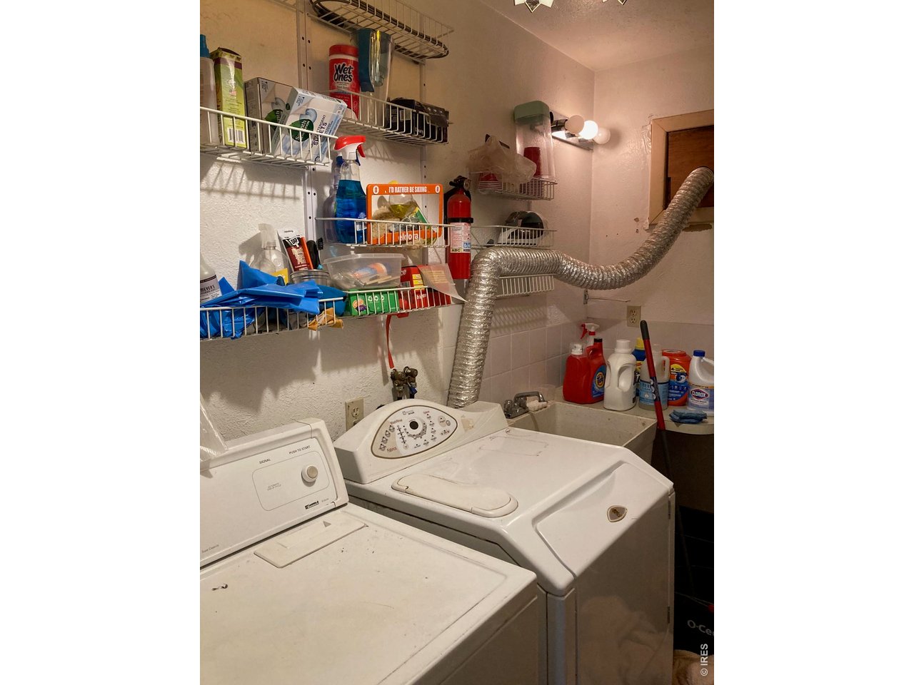 1064 Cold Springs Road Nederland, CO 80466 - Photo 7 of 48 a utility room with dryer and washer