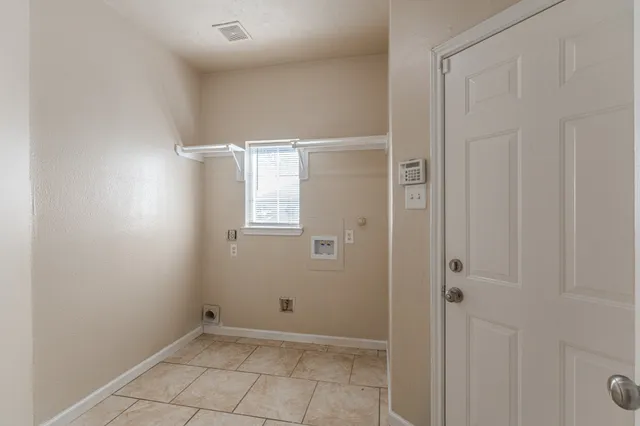 a view of a backyard with pathway