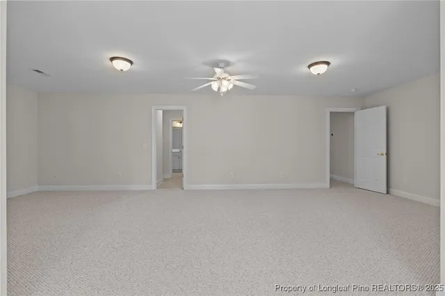 a bathroom with a sink a light fixture and a vanity