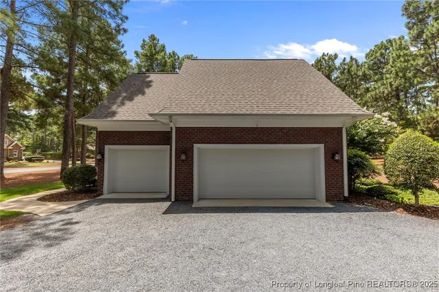 a view of a room with cabinet and air conditioner duct