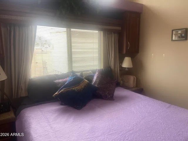 a bed room with a bed and a couch