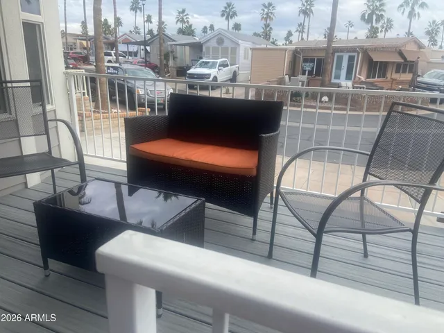 a view of a table and chairs in patio