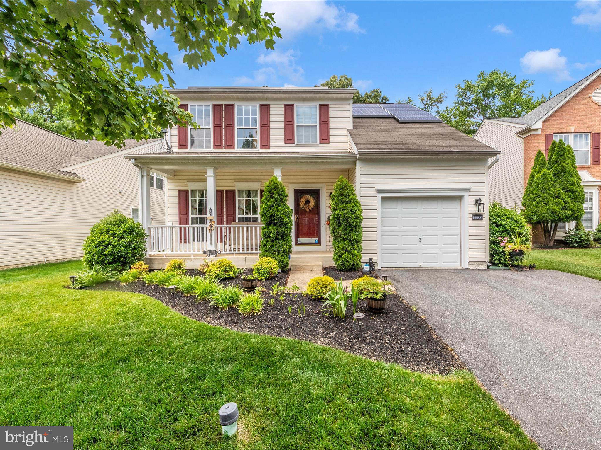 7732 Rotherham Drive Hanover, MD 21076 - Photo 1 of 55 a front view of a house with garden