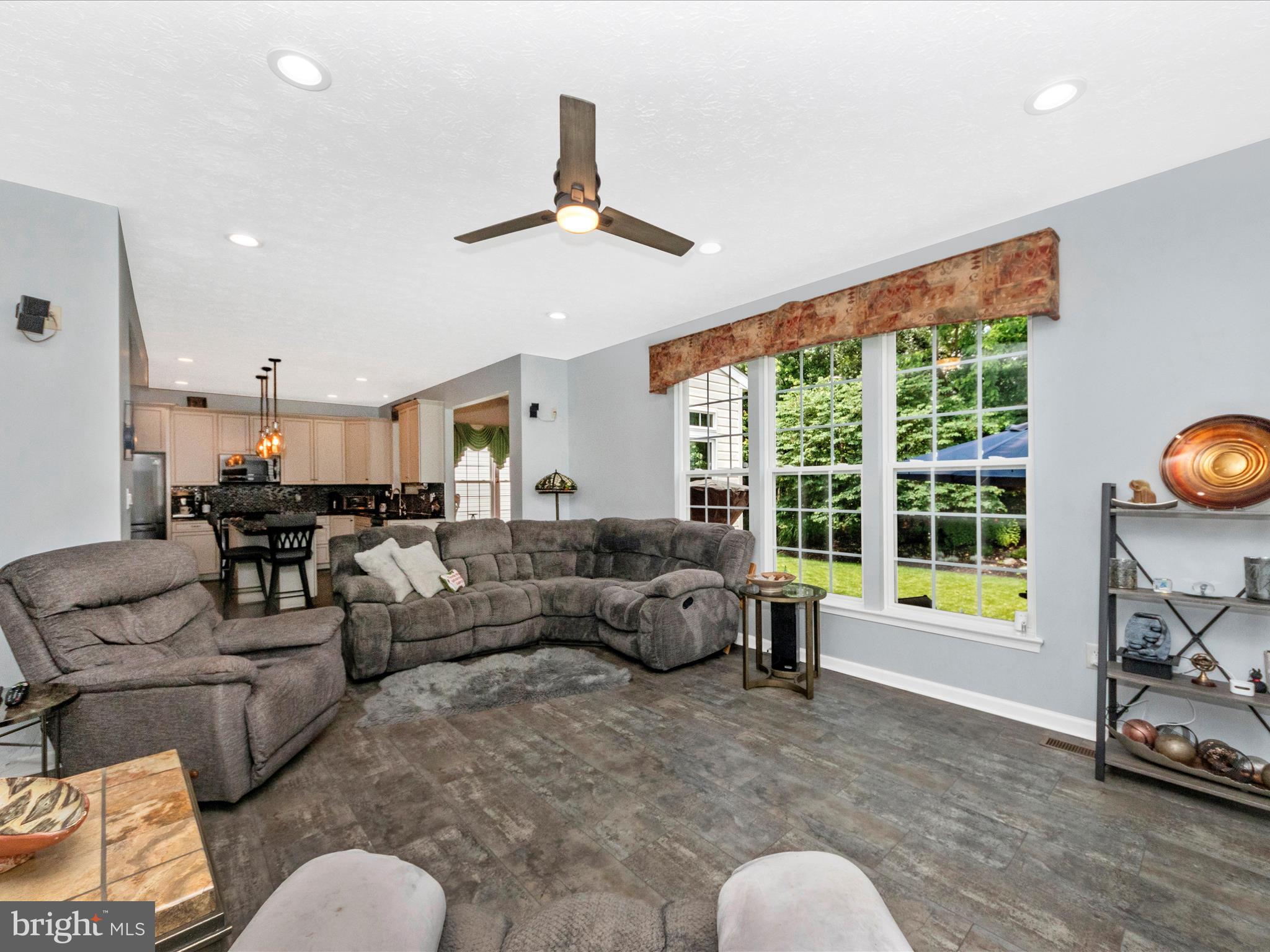 7732 Rotherham Drive Hanover, MD 21076 - Photo 14 of 55 a living room with furniture and a large window