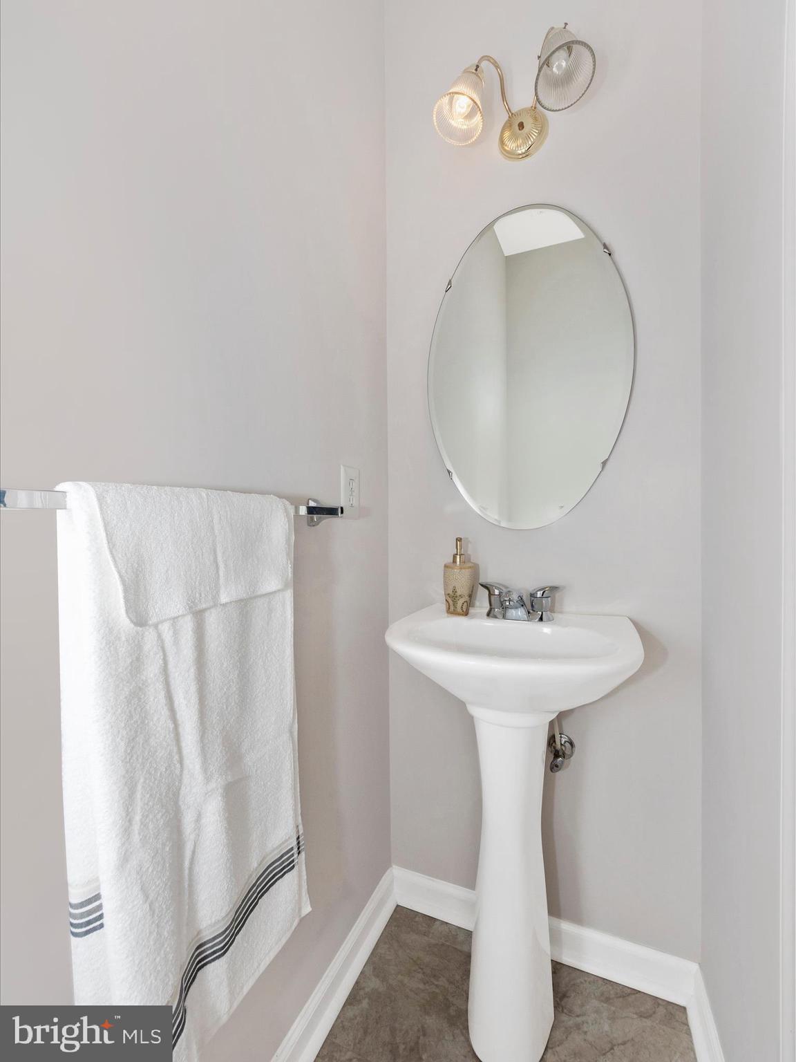 7732 Rotherham Drive Hanover, MD 21076 - Photo 19 of 55 a bathroom with a sink toilet and shower