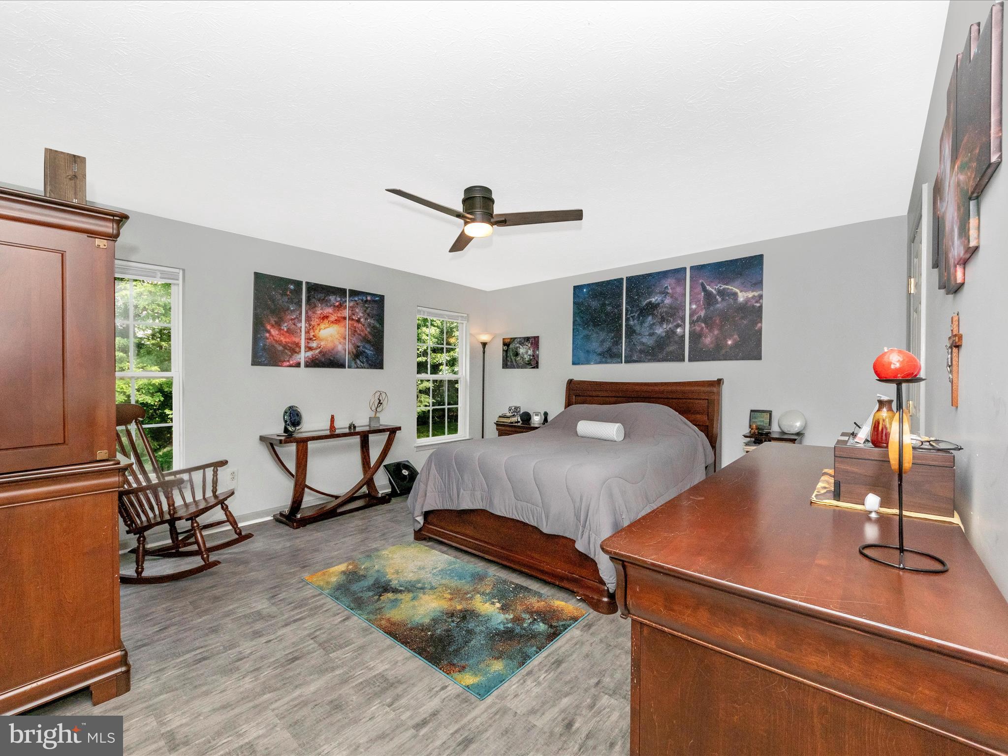7732 Rotherham Drive Hanover, MD 21076 - Photo 20 of 55 a living room with furniture and a flat screen tv