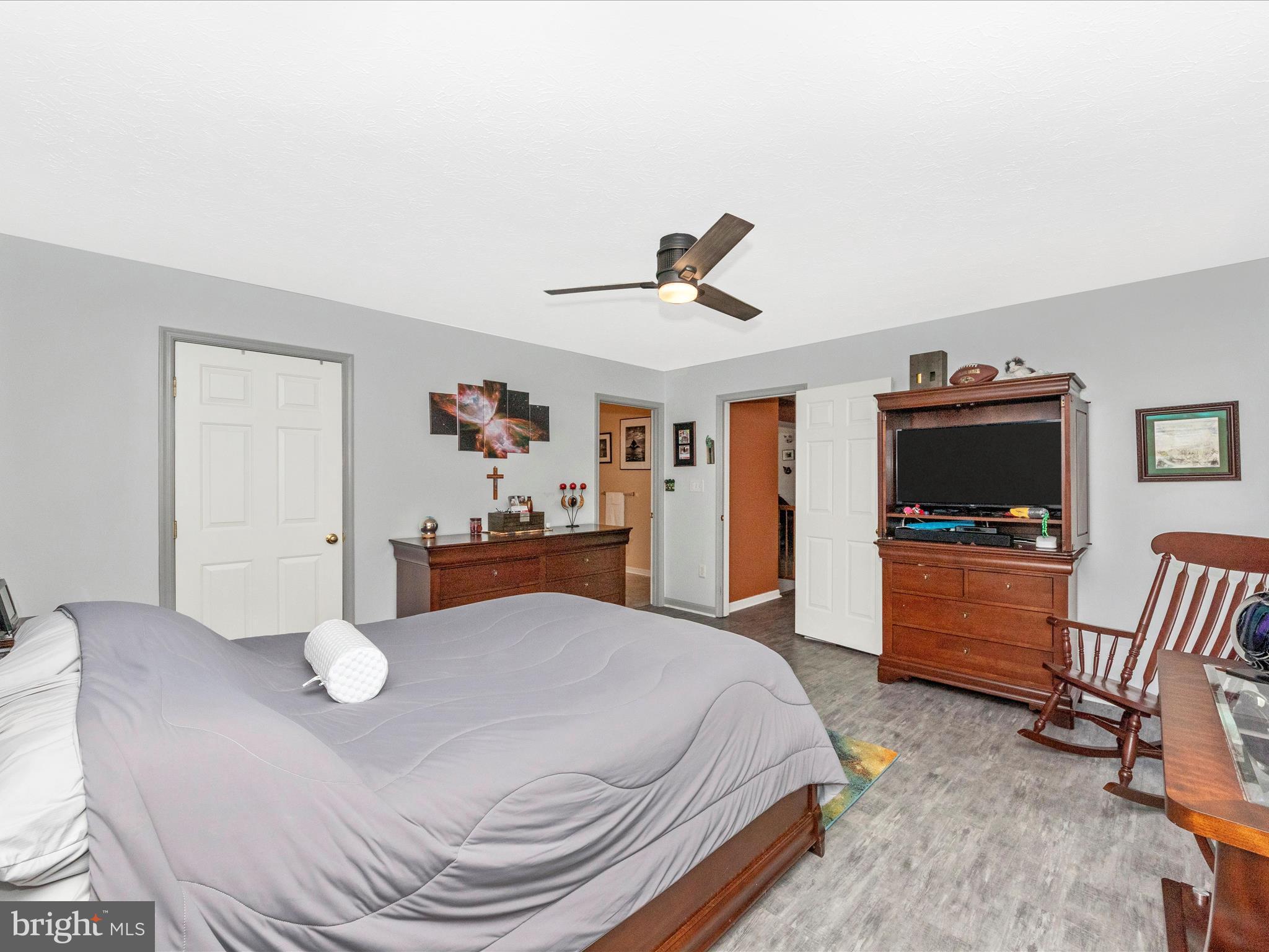 7732 Rotherham Drive Hanover, MD 21076 - Photo 23 of 55 a bed room with a bed and a television