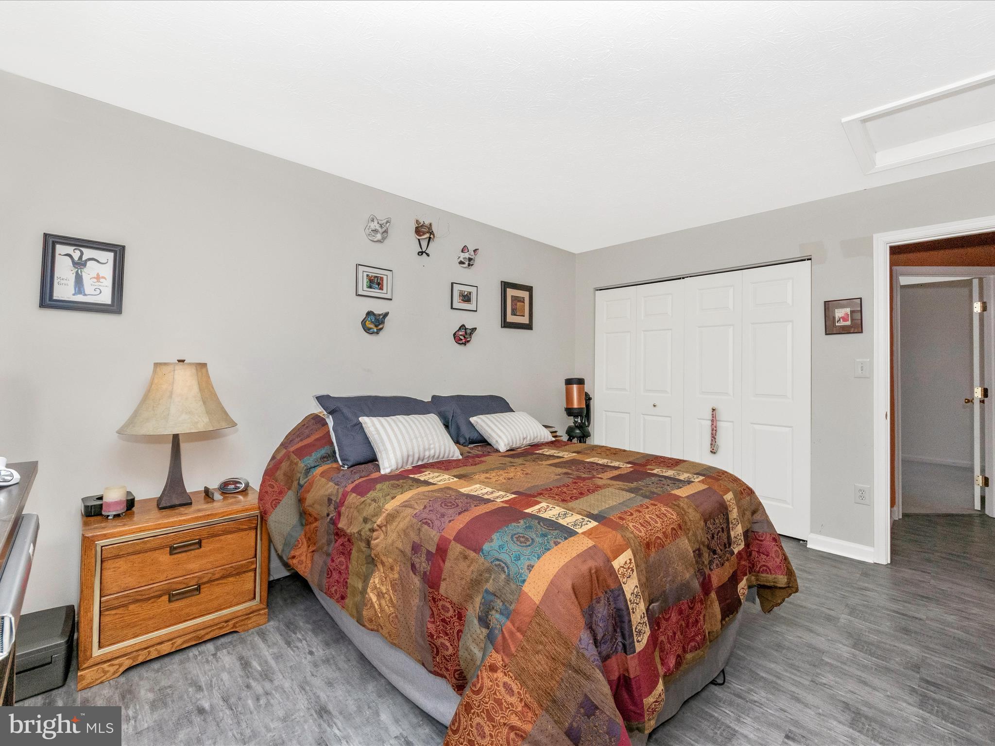 7732 Rotherham Drive Hanover, MD 21076 - Photo 29 of 55 a bedroom with bed and a lamp on dresser