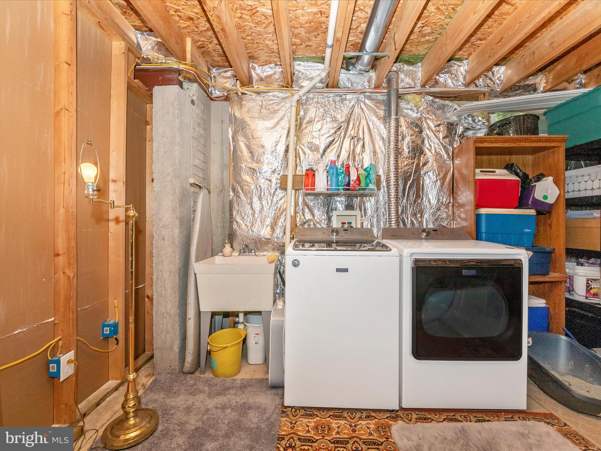 7732 Rotherham Drive Hanover, MD 21076 - Photo 33 of 55 a utility room with dryer and washer