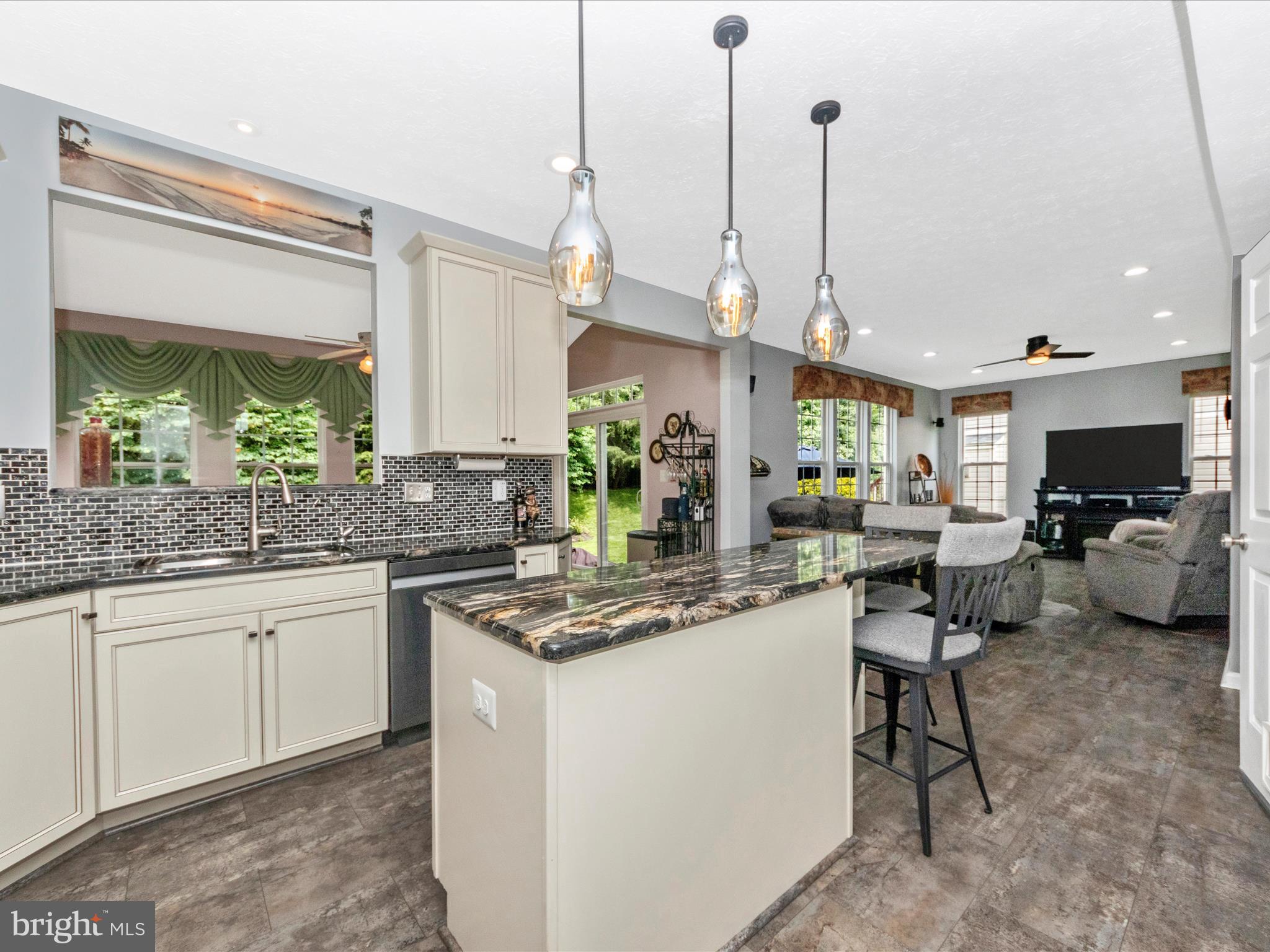 7732 Rotherham Drive Hanover, MD 21076 - Photo 4 of 55 a kitchen with stainless steel appliances granite countertop a sink and a stove
