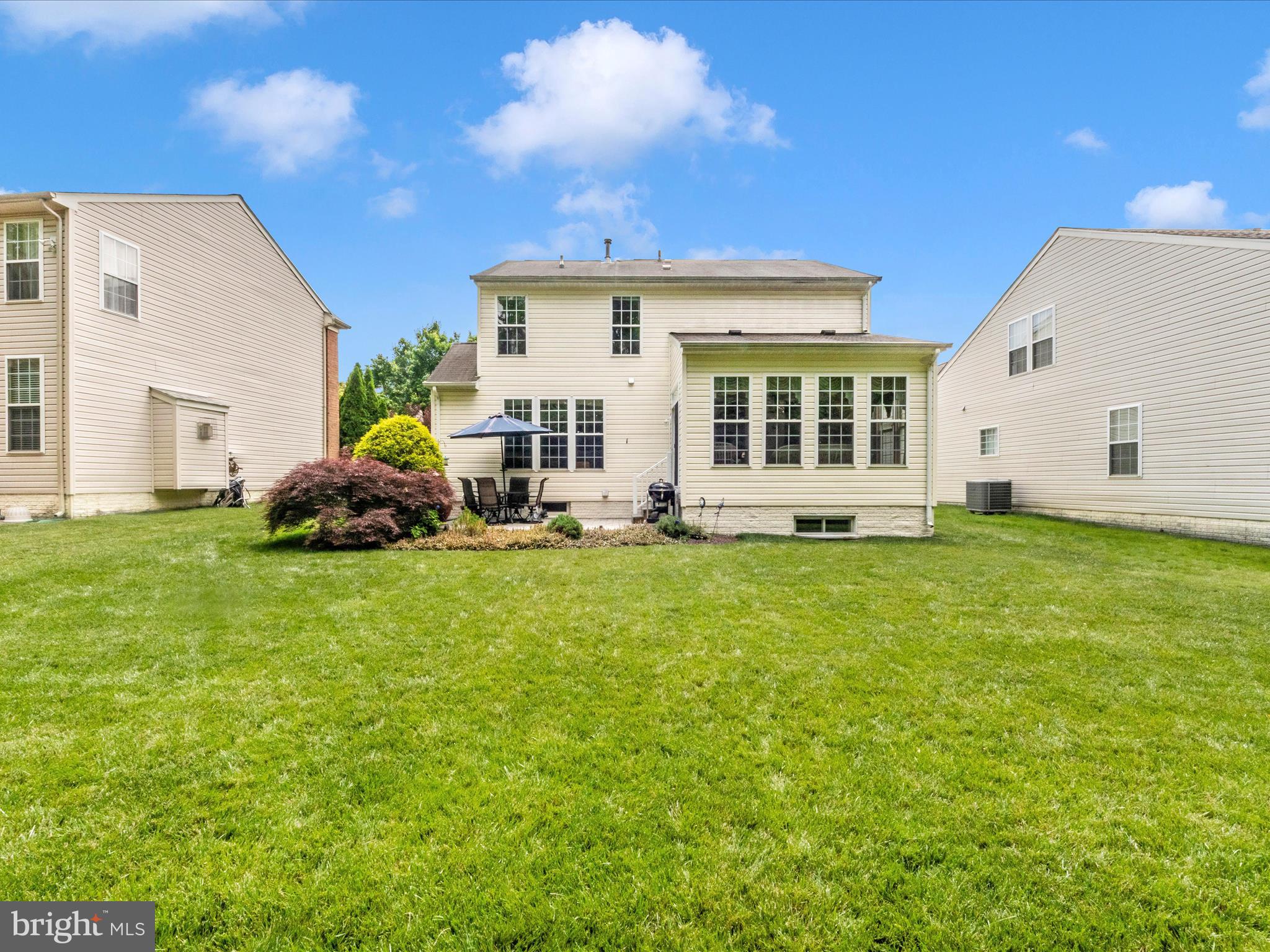 7732 Rotherham Drive Hanover, MD 21076 - Photo 42 of 55 a front view of house with yard and outdoor seating