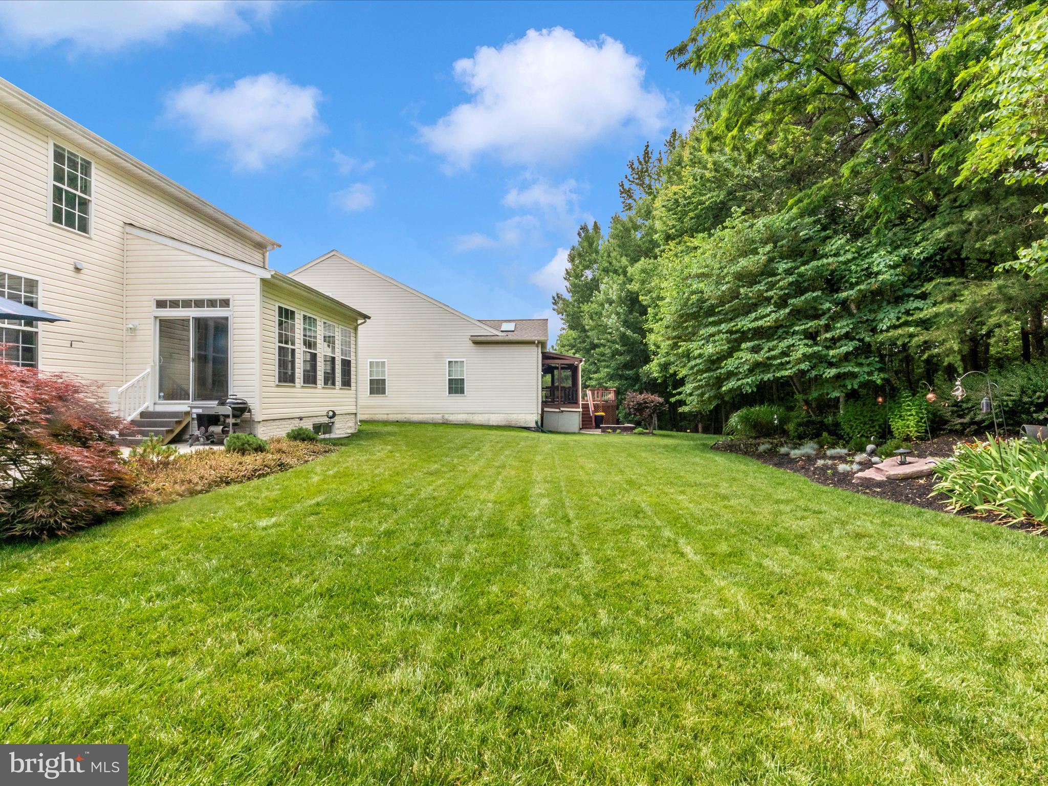 7732 Rotherham Drive Hanover, MD 21076 - Photo 44 of 55 a front view of house with yard and green space