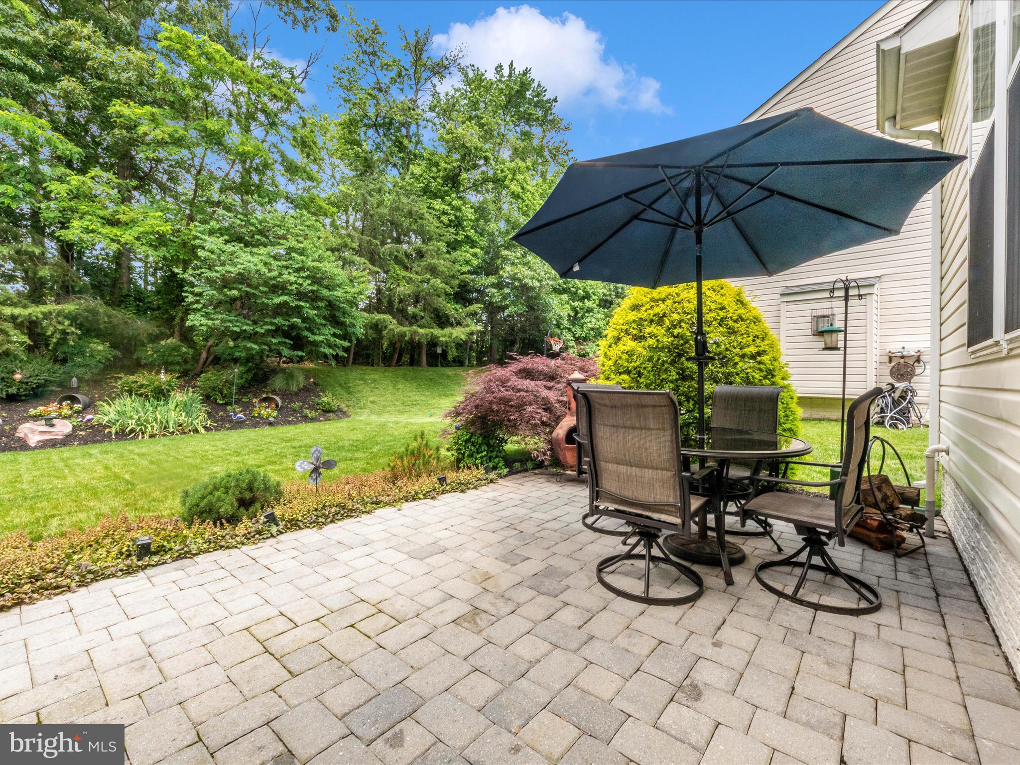 7732 Rotherham Drive Hanover, MD 21076 - Photo 47 of 55 a view of backyard with sitting area and furniture