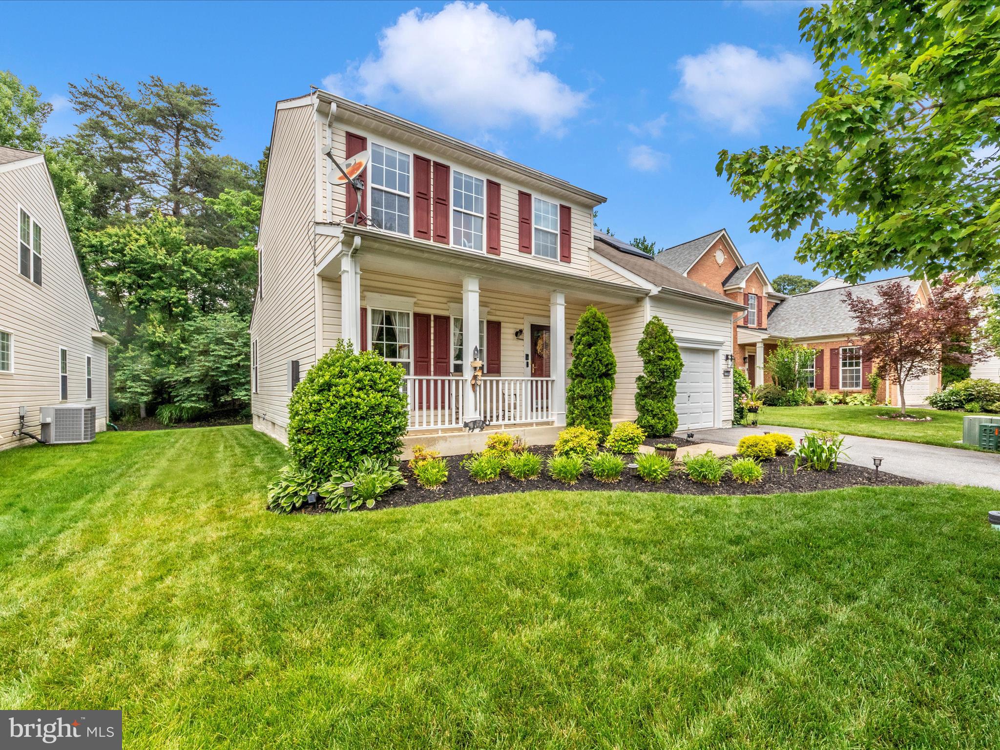 7732 Rotherham Drive Hanover, MD 21076 - Photo 52 of 55 a front view of a house with a yard