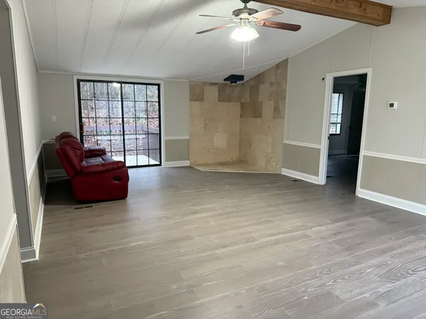 wooden floor and windows in a room