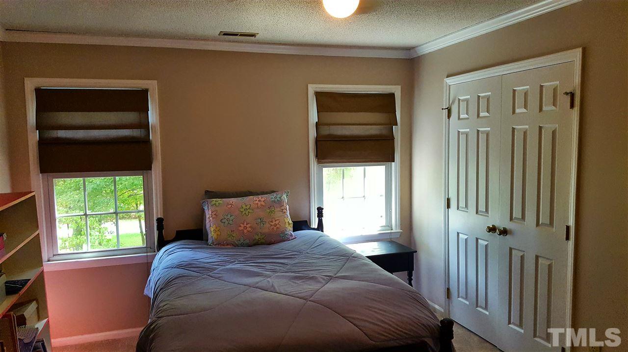 1113 Hamilton Way Durham, NC 27713 - Photo 18 of 25 a bedroom with a bed and a window