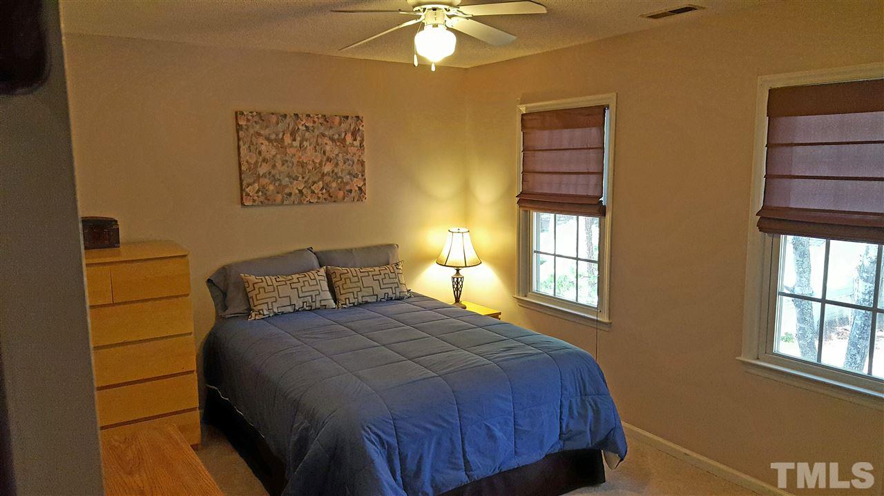 1113 Hamilton Way Durham, NC 27713 - Photo 20 of 25 a bedroom with a bed and a window