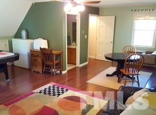 1113 Hamilton Way Durham, NC 27713 - Photo 23 of 25 a living room with furniture and wooden floor