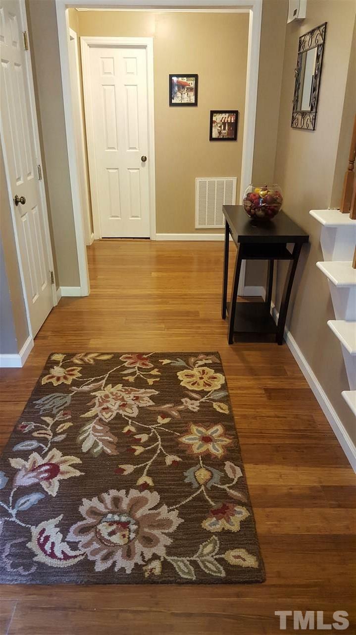 1113 Hamilton Way Durham, NC 27713 - Photo 4 of 25 a view of a livingroom with wooden floor