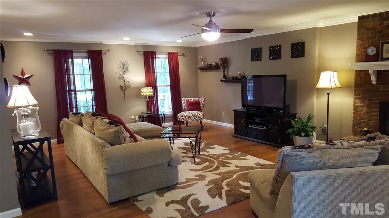 1113 Hamilton Way Durham, NC 27713 - Photo 5 of 25 a living room with furniture and a flat screen tv