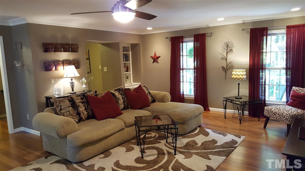 1113 Hamilton Way Durham, NC 27713 - Photo 6 of 25 a living room with furniture and wooden floor
