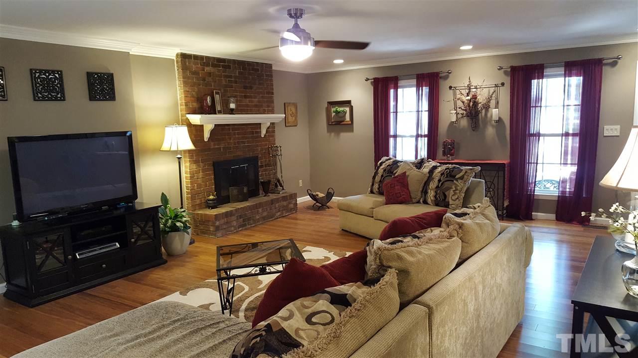 1113 Hamilton Way Durham, NC 27713 - Photo 7 of 25 a living room with furniture and a flat screen tv