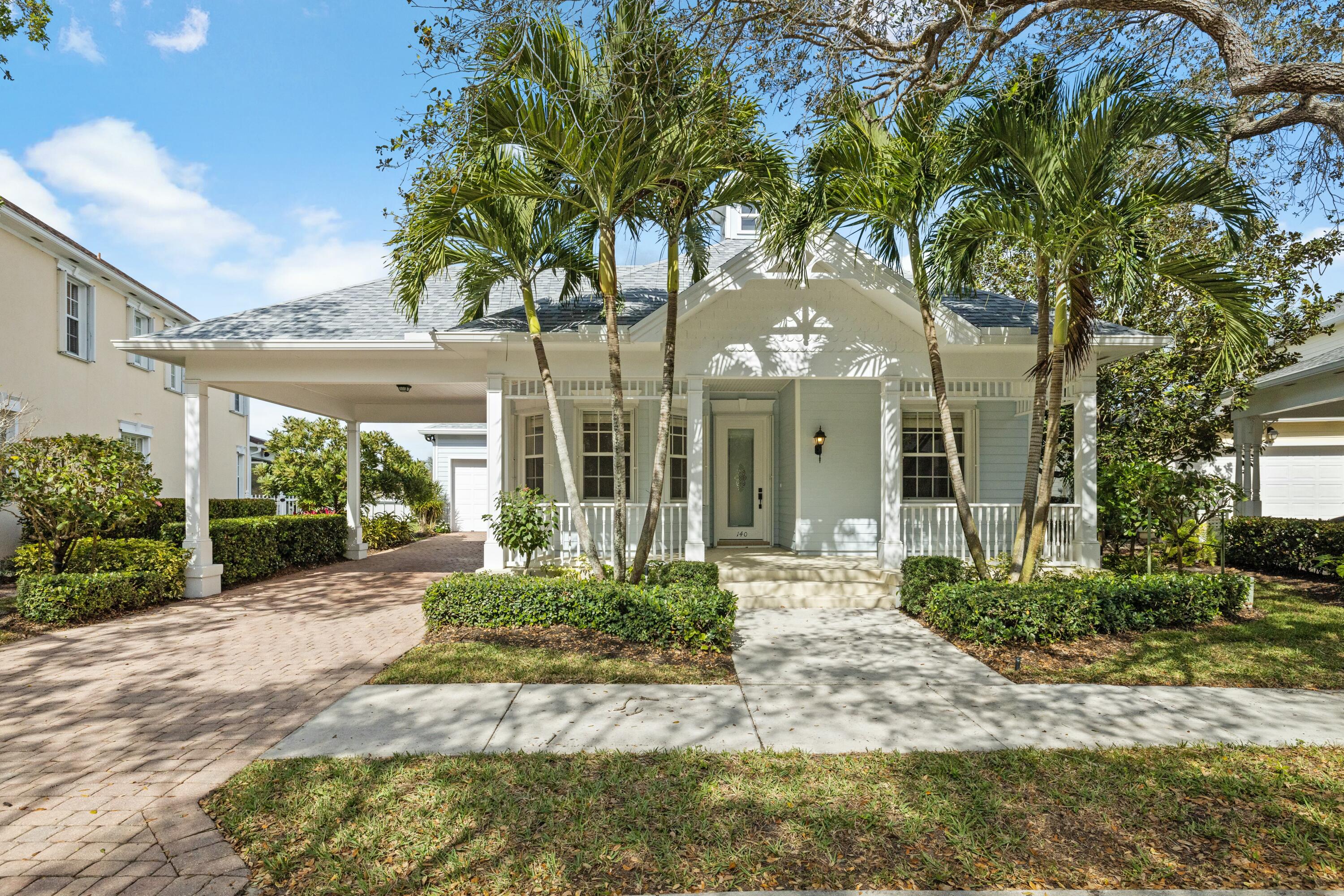 140 Barbados Drive Jupiter, FL 33458 - Photo 1 of 42 front view of a house with a porch