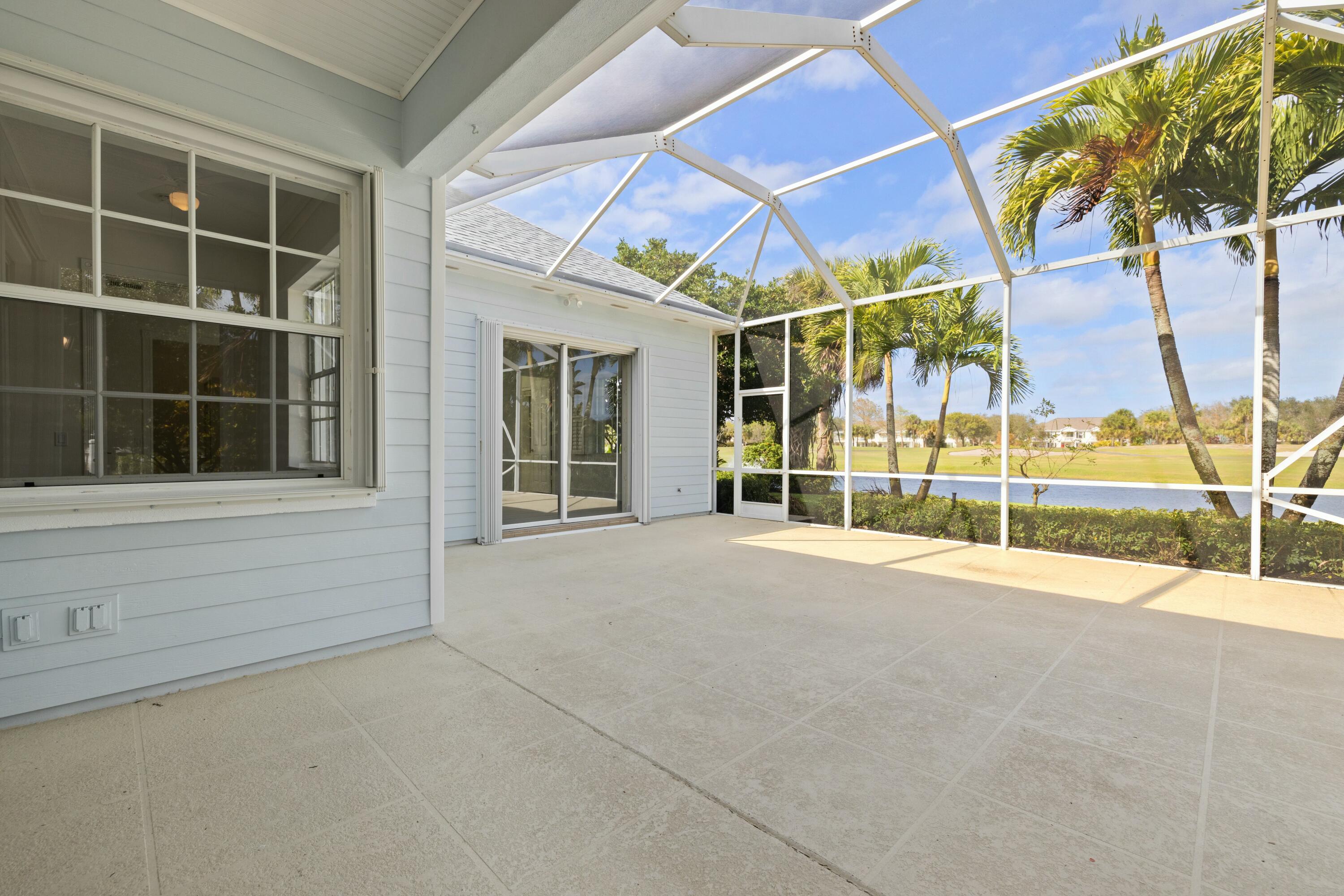 140 Barbados Drive Jupiter, FL 33458 - Photo 13 of 42 a view of an empty room with a balcony