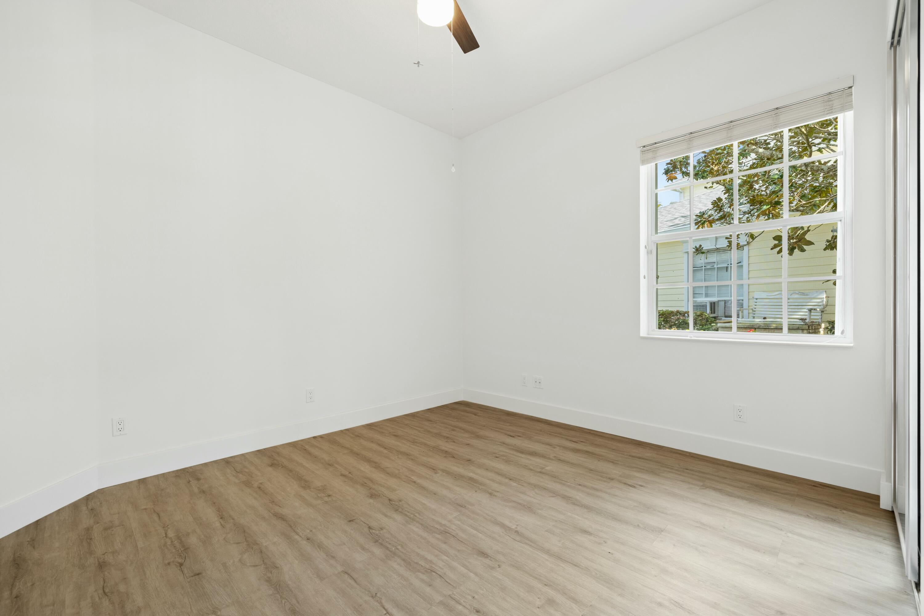 140 Barbados Drive Jupiter, FL 33458 - Photo 23 of 42 an empty room with a window