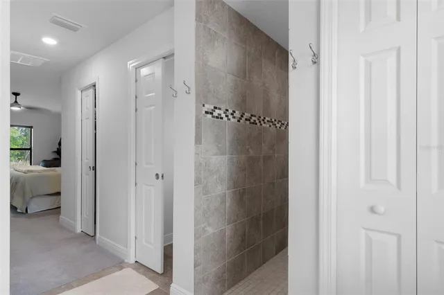 a bed room with a bed and a dresser