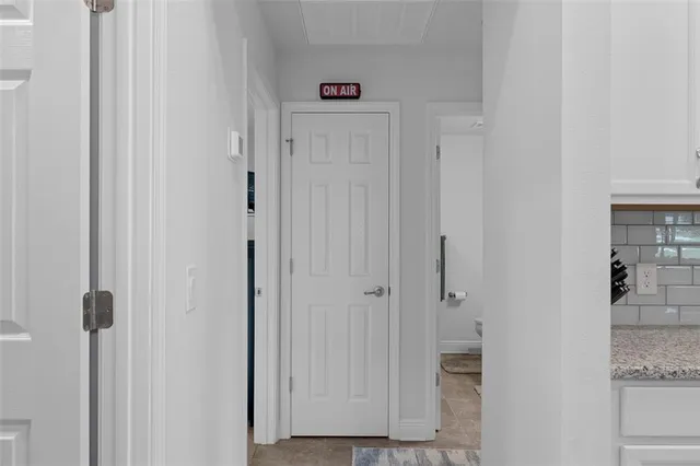a bathroom with a sink vanity and mirror