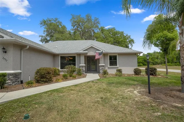 a house view with a garden space