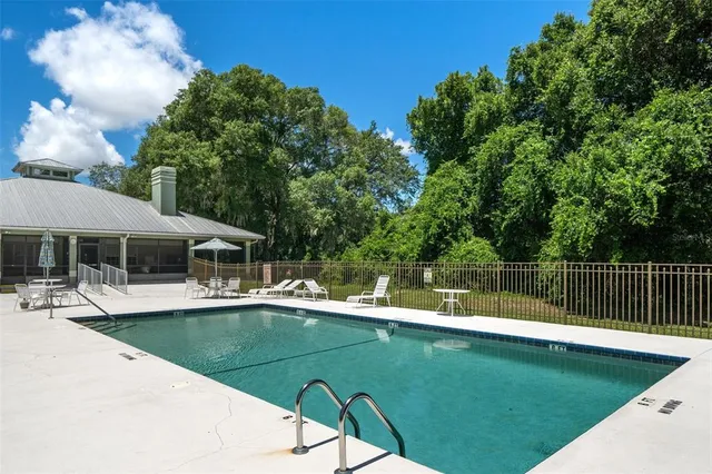a view of a swimming pool with an outdoor space