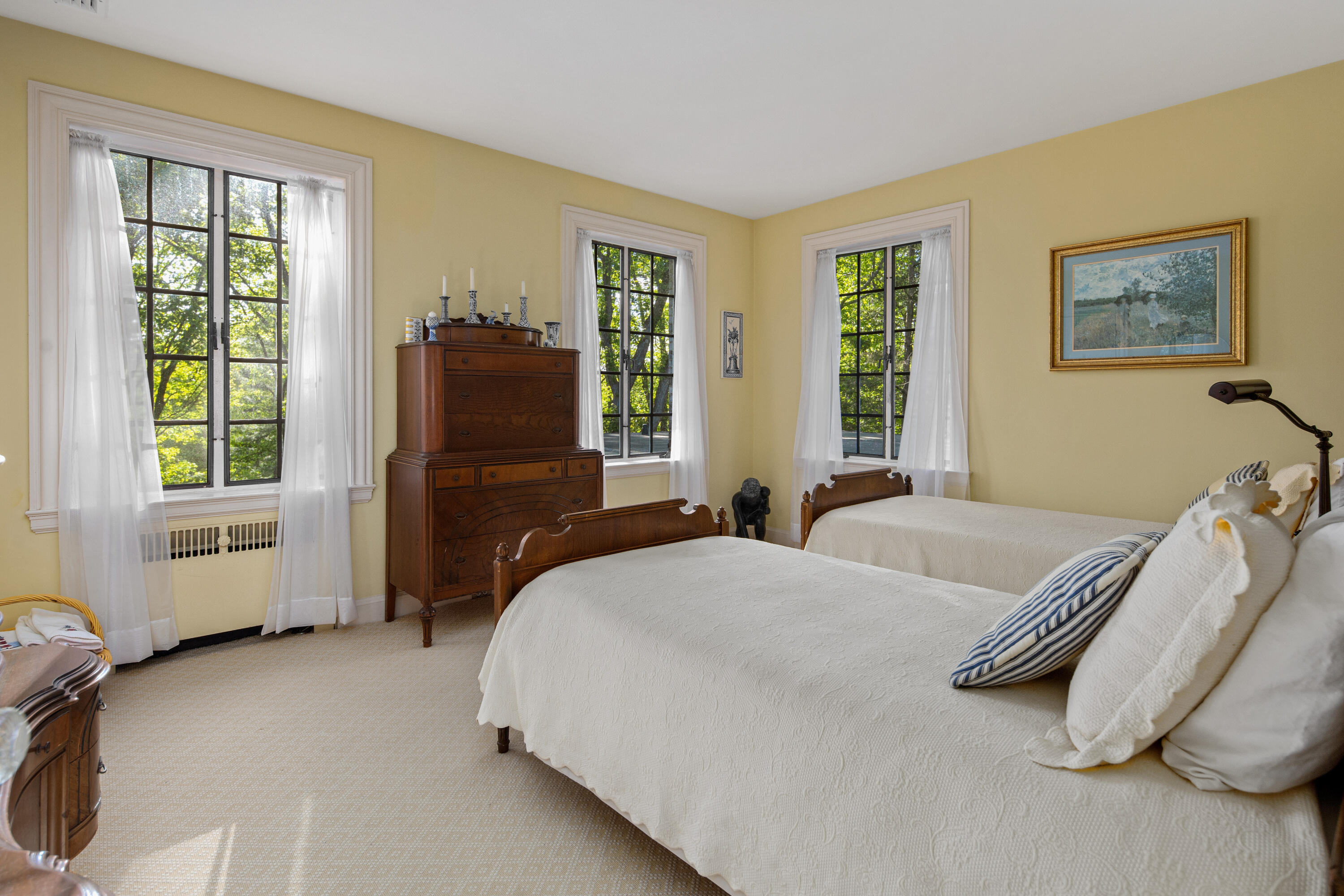 360 Greenley Road New Canaan, CT 06840 - Photo 16 of 22 a bedroom with bed and glass windows